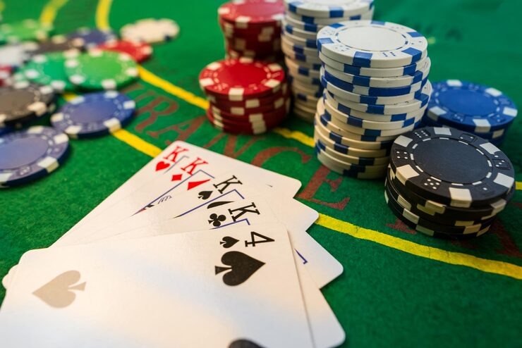 kapital 4d mobile app showing live-dealer table, sportsbook odds, and account dashboard